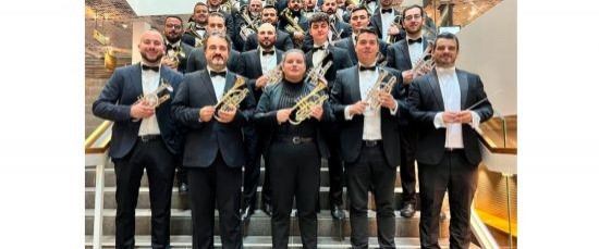 DOS BOLLULLEROS ENTRE LOS  INTEGRANTES DE LA MÁLAGA BRASS BAND